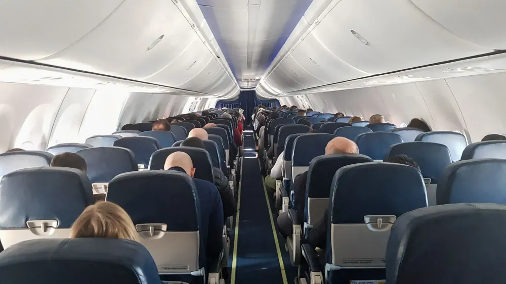 Interior of airplane with passengers